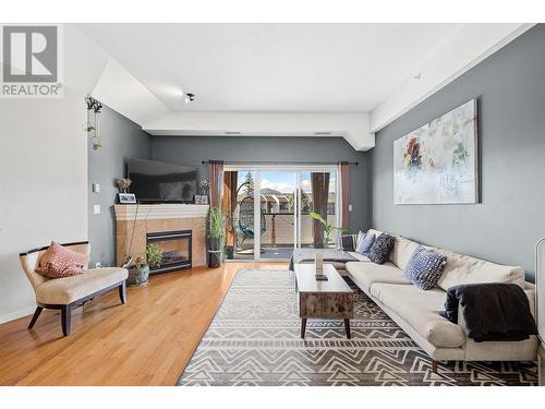 1905 Pandosy Street Unit# 303, Kelowna, BC - Indoor Photo Showing Living Room With Fireplace