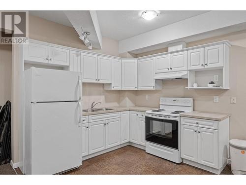 1905 Pandosy Street Unit# 303, Kelowna, BC - Indoor Photo Showing Kitchen With Double Sink