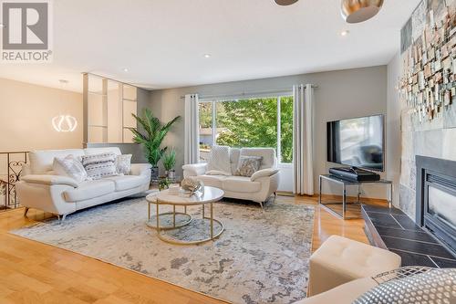 1264 Rio Drive, Kelowna, BC - Indoor Photo Showing Living Room With Fireplace