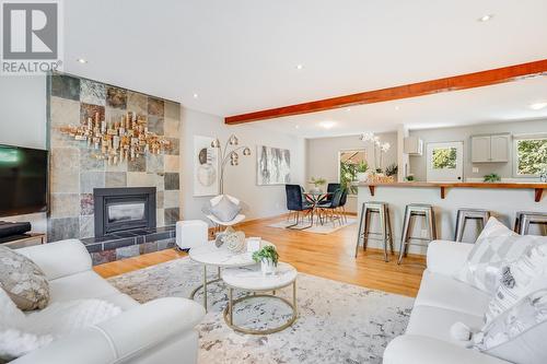 1264 Rio Drive, Kelowna, BC - Indoor Photo Showing Living Room With Fireplace