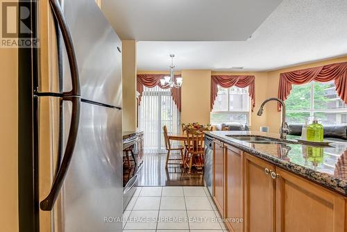 209 - 350 Princess Royal Drive, Mississauga (City Centre), ON - Indoor Photo Showing Kitchen With Double Sink