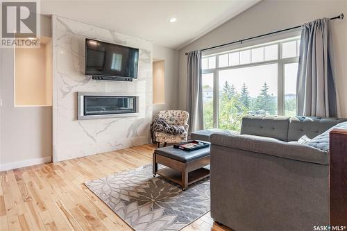 722 Crystal Springs Drive, Warman, SK - Indoor Photo Showing Living Room With Fireplace