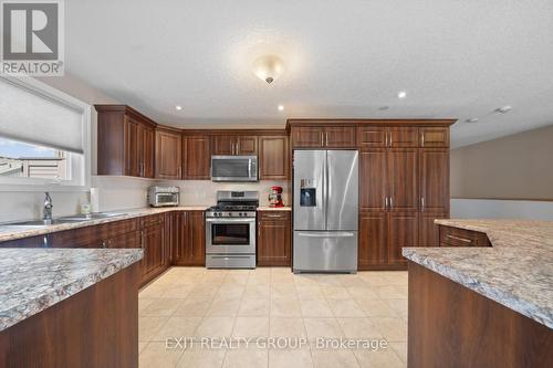 82 Dorchester Drive, Prince Edward County (Wellington), ON - Indoor Photo Showing Kitchen With Double Sink