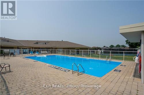 82 Dorchester Drive, Prince Edward County (Wellington), ON - Outdoor With In Ground Pool