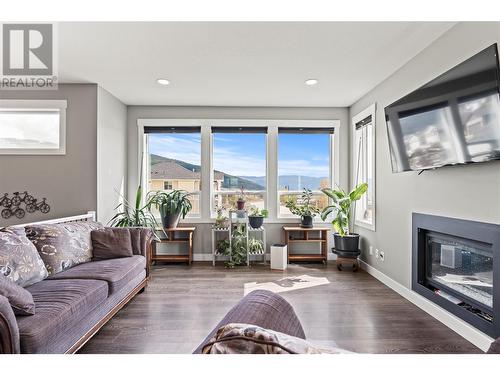 285 Kicking Horse Place, Vernon, BC - Indoor Photo Showing Living Room With Fireplace