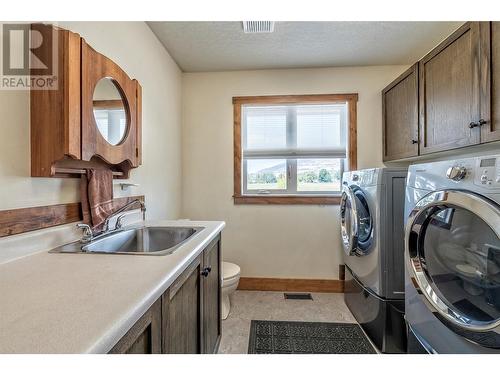 7800 Howe Drive, Coldstream, BC - Indoor Photo Showing Laundry Room