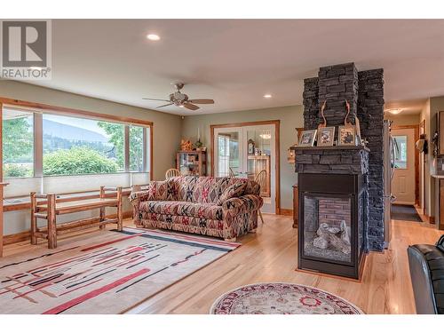 7800 Howe Drive, Coldstream, BC - Indoor Photo Showing Living Room With Fireplace