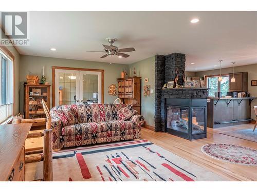 7800 Howe Drive, Coldstream, BC - Indoor Photo Showing Living Room With Fireplace