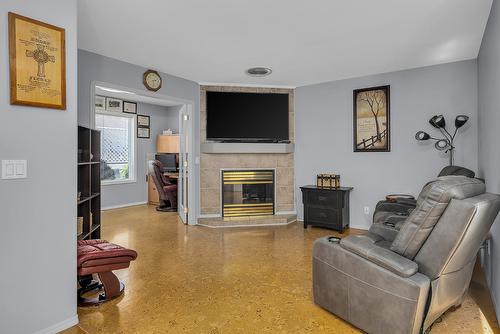 130-2250 Louie Drive, West Kelowna, BC - Indoor Photo Showing Living Room With Fireplace