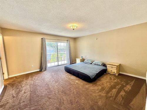 519 Mayne Avenue, Princeton, BC - Indoor Photo Showing Bedroom