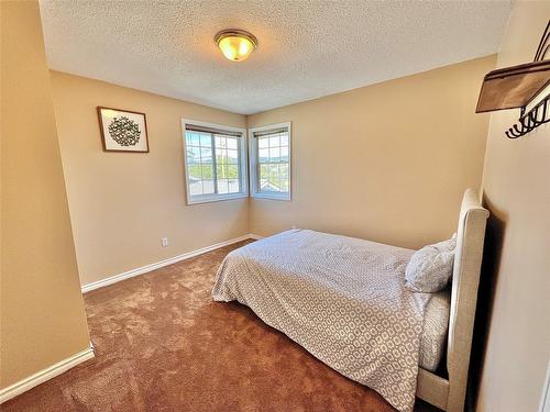 519 Mayne Avenue, Princeton, BC - Indoor Photo Showing Bedroom