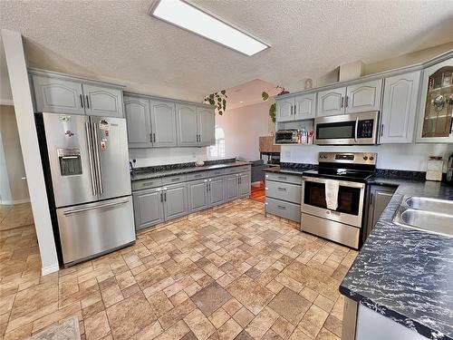 519 Mayne Avenue, Princeton, BC - Indoor Photo Showing Kitchen With Double Sink