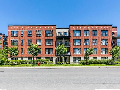 Vue d'ensemble - 212-2555 Rue Grenet, Montréal (Saint-Laurent), QC - Outdoor With Balcony With Facade