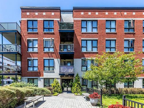 EntrÃ©e extÃ©rieure - 212-2555 Rue Grenet, Montréal (Saint-Laurent), QC - Outdoor With Balcony With Facade