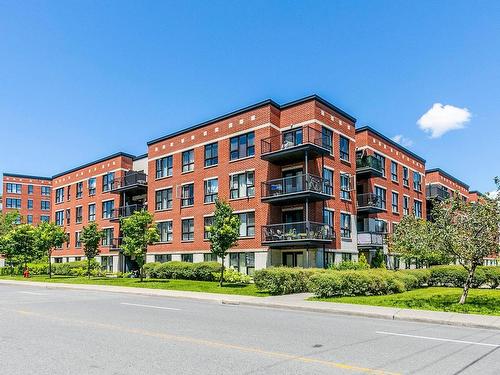 Vue d'ensemble - 212-2555 Rue Grenet, Montréal (Saint-Laurent), QC - Outdoor With Balcony With Facade