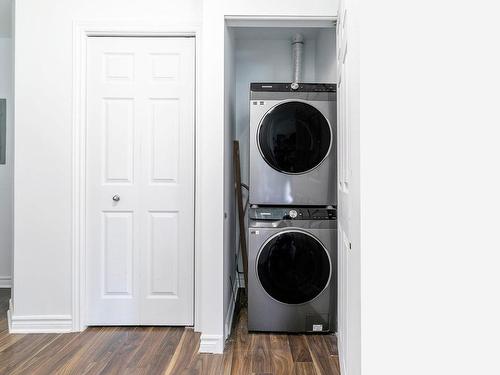 Salle de lavage - 212-2555 Rue Grenet, Montréal (Saint-Laurent), QC - Indoor Photo Showing Laundry Room