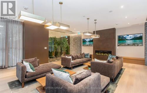 1408 - 10 Deerlick Court, Toronto (Parkwoods-Donalda), ON - Indoor Photo Showing Living Room With Fireplace