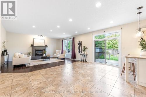 1750 Tigerlily Road, London, ON - Indoor Photo Showing Living Room With Fireplace