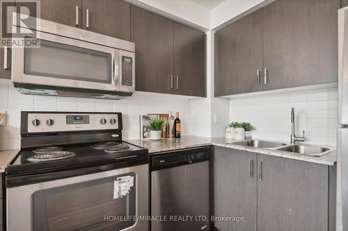 607 - 80 Esther Lorrie Drive, Toronto (West Humber-Clairville), ON - Indoor Photo Showing Kitchen With Double Sink