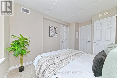 302 - 716 Main Street E, Milton (Old Milton), ON - Indoor Photo Showing Bedroom