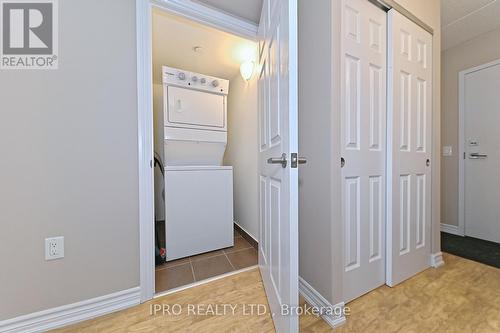 302 - 716 Main Street E, Milton (Old Milton), ON - Indoor Photo Showing Laundry Room