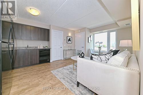 302 - 716 Main Street E, Milton, ON - Indoor Photo Showing Living Room