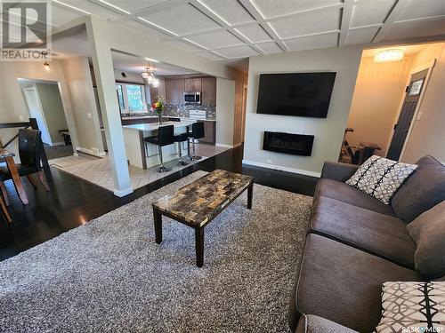 706 Balfour Street, Whitewood, SK - Indoor Photo Showing Living Room With Fireplace