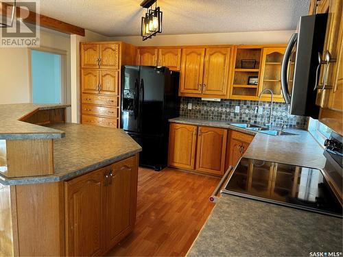 907 Corrigan Street, Lampman, SK - Indoor Photo Showing Kitchen With Double Sink