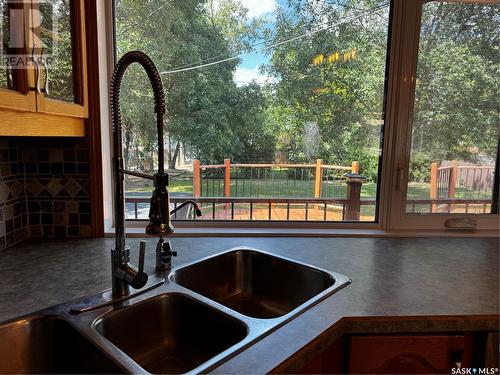 907 Corrigan Street, Lampman, SK - Indoor Photo Showing Kitchen With Double Sink