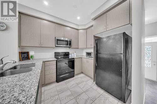 16 Boothill Drive, Brampton, ON - Indoor Photo Showing Kitchen With Double Sink