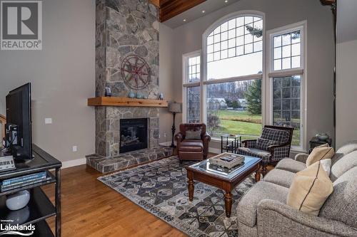 3876 Muskoka 118 Highway W Unit# Carling 3 Week 9, Port Carling, ON - Indoor Photo Showing Living Room With Fireplace