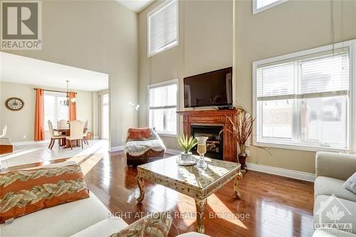 717 Lakebreeze Circle, Ottawa, ON - Indoor Photo Showing Living Room With Fireplace