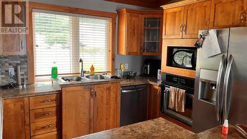 69-71 Gallows Cove Road, Witless Bay, NL - Indoor Photo Showing Kitchen With Double Sink