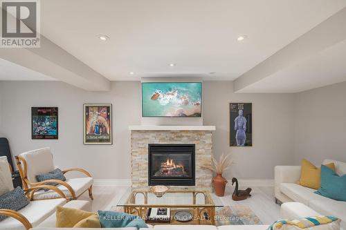 16 - 310 Ridge Road S, Fort Erie, ON - Indoor Photo Showing Living Room With Fireplace