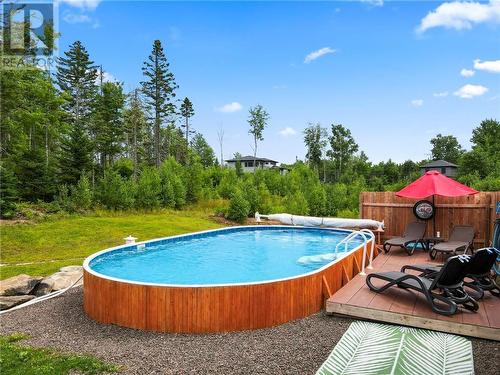 1693 Melanson, Dieppe, NB - Outdoor With Above Ground Pool With Backyard