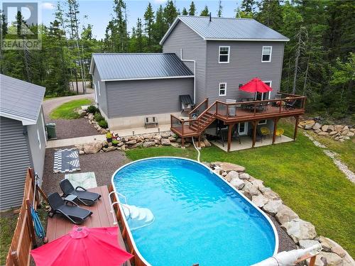 1693 Melanson, Dieppe, NB - Outdoor With Above Ground Pool With Deck Patio Veranda With Backyard With Exterior