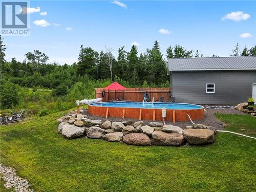 1693 Melanson, Dieppe, NB - Outdoor With Above Ground Pool With Backyard