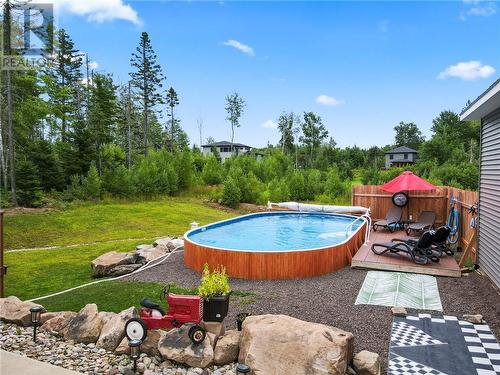 1693 Melanson, Dieppe, NB - Outdoor With Above Ground Pool With Backyard