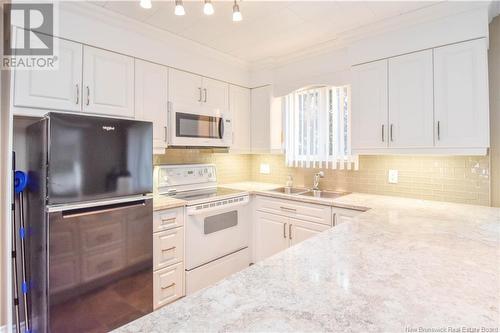 851 Saint-Joseph Boulevard, Saint-Léolin, NB - Indoor Photo Showing Kitchen With Double Sink