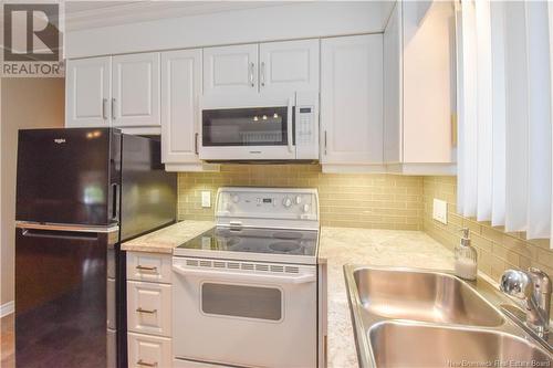 851 Saint-Joseph Boulevard, Saint-Léolin, NB - Indoor Photo Showing Kitchen With Double Sink