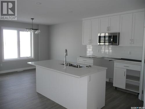 423 Pepper Street, Saskatoon, SK - Indoor Photo Showing Kitchen With Double Sink