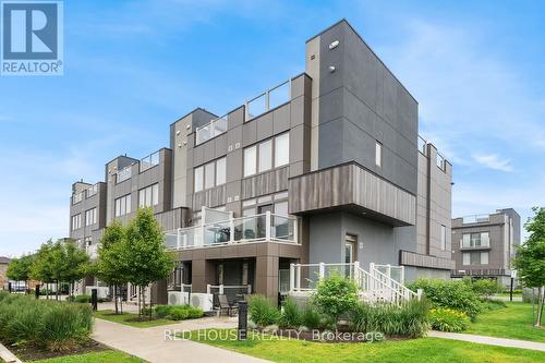 21 - 261 Skinner Road, Hamilton (Waterdown), ON - Outdoor With Facade