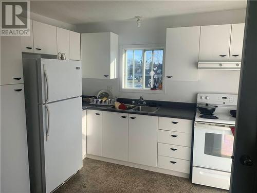 198 Victoria, Edmundston, NB - Indoor Photo Showing Kitchen With Double Sink