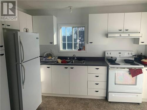 198 Victoria, Edmundston, NB - Indoor Photo Showing Kitchen With Double Sink