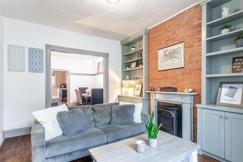 176 Wilson Street, Hamilton, ON - Indoor Photo Showing Living Room With Fireplace