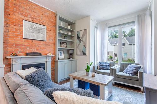 176 Wilson Street, Hamilton, ON - Indoor Photo Showing Living Room With Fireplace