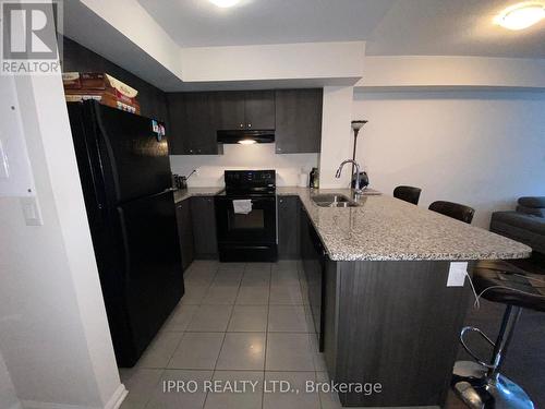 112 - 60 Baycliffe Crescent, Brampton, ON - Indoor Photo Showing Kitchen With Double Sink