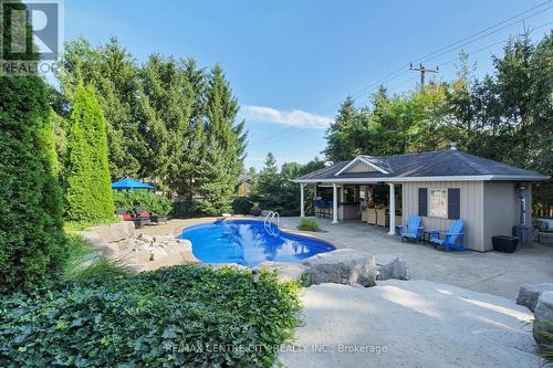 11 Woodland Drive, Middlesex Centre (Kilworth), ON - Outdoor With In Ground Pool