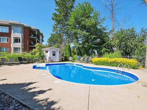 Piscine - 202-101 Ch. De La Grande-Côte, Lorraine, QC - Outdoor With In Ground Pool With Backyard