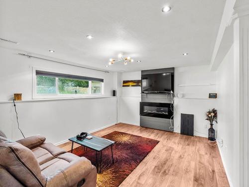 443 Opal Drive, Logan Lake, BC - Indoor Photo Showing Living Room With Fireplace